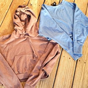 A bunsle of cropped Sweatshirts